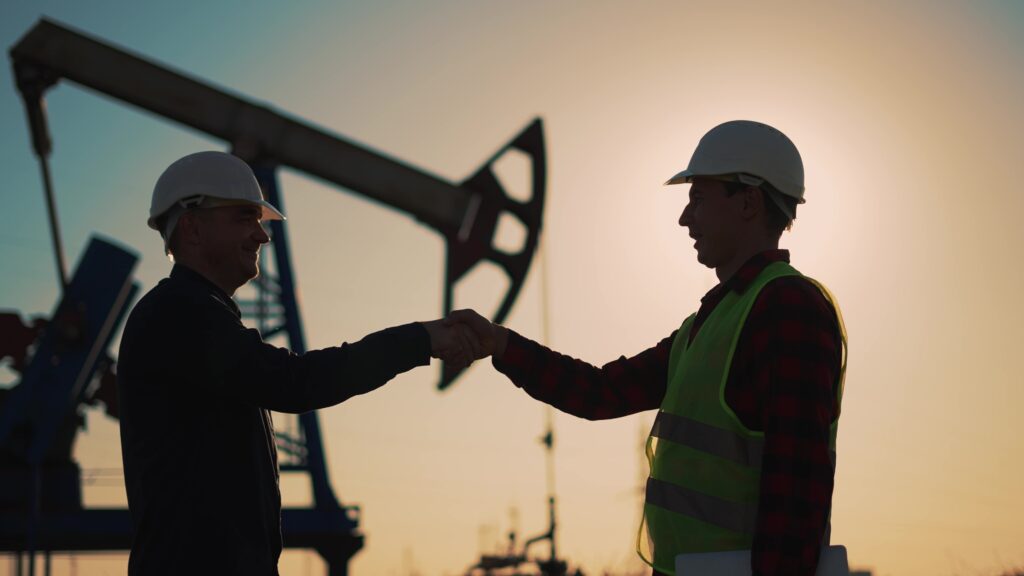 Oil Pump Engineers Handshake.